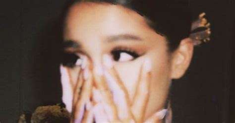 naked ariana grande|Ariana Grande Reposts Deleted Painted Topless Photo